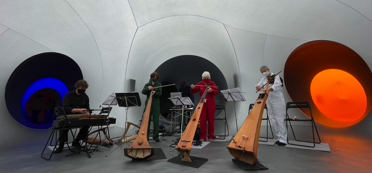 giant bowed instruments performed in colourscape
