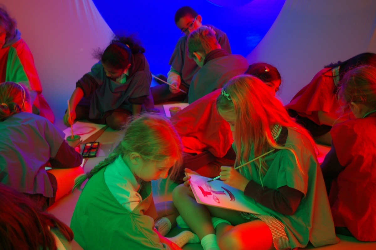 Children doing a painting workshop in colourscape